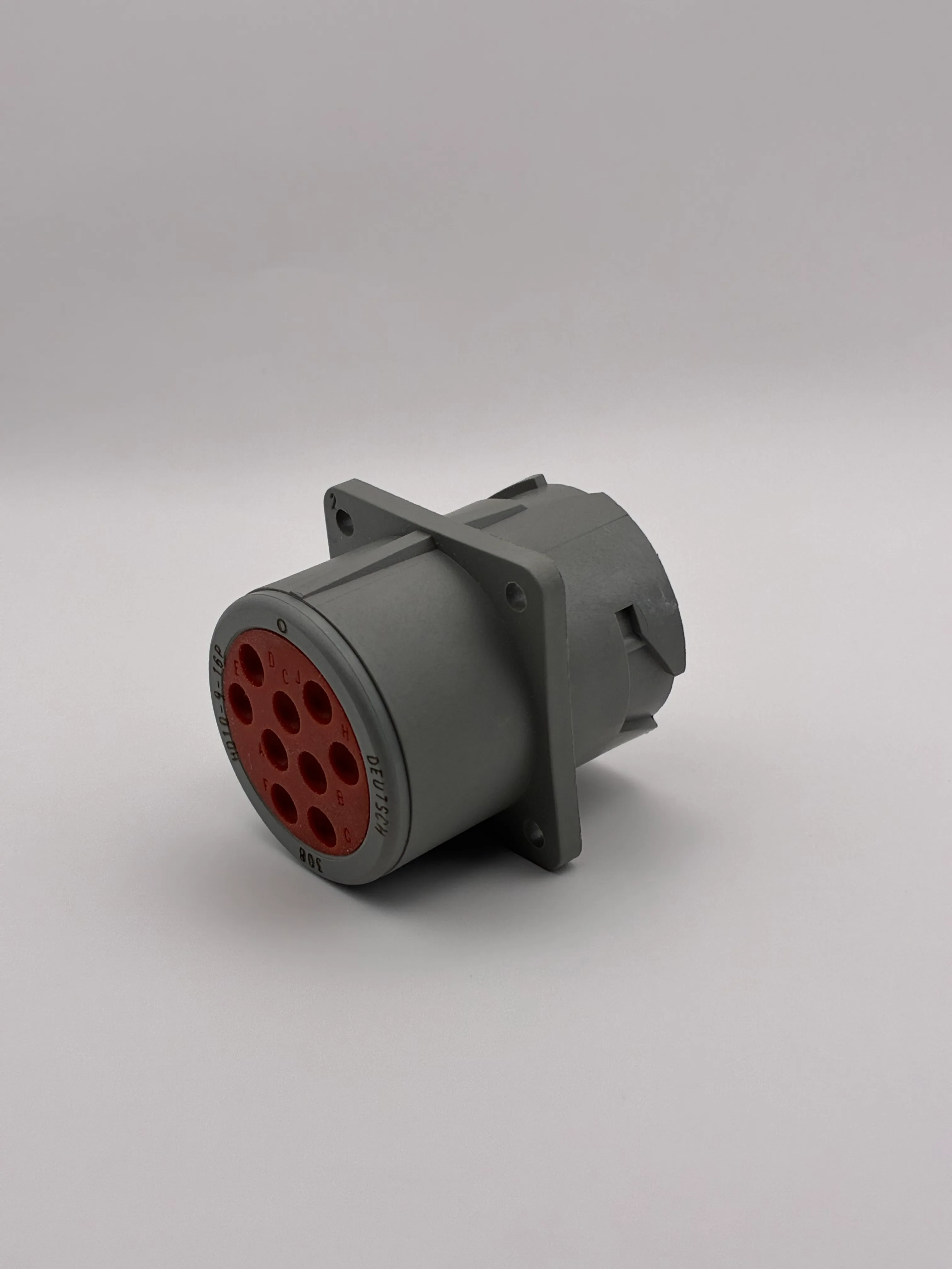 Angled view of the Deutsch HD10-9-16P flange-mount receptacle housing