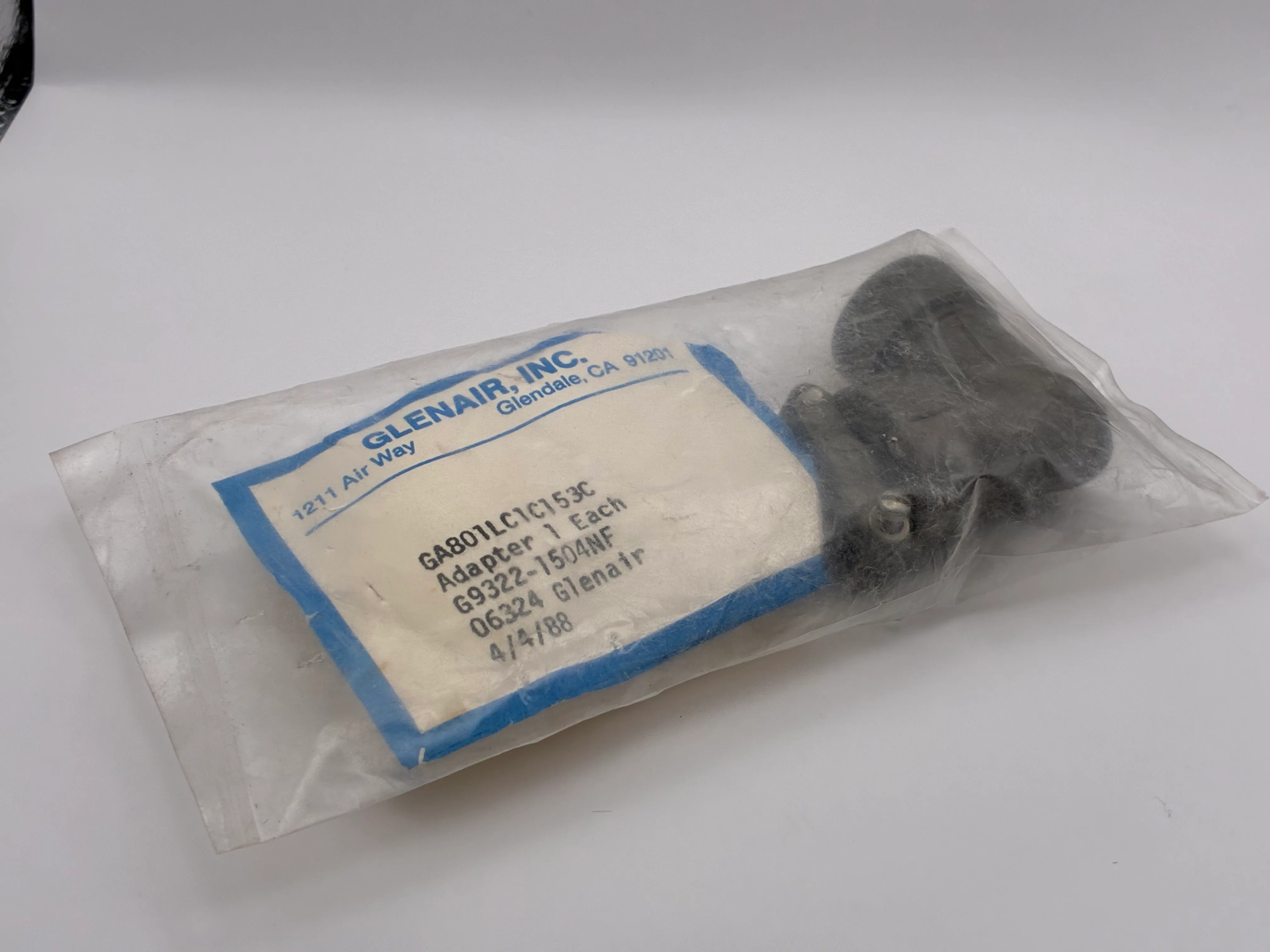 Sealed Glenair bag with GA801LC1C153C label and adapter inside